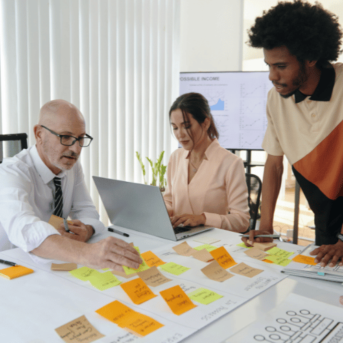 A group of employees reflecting on their career direction, representing early-career and mid-level professionals who feel stuck or unsure about progression — aligned with Career Navigator’s career coaching for employees.